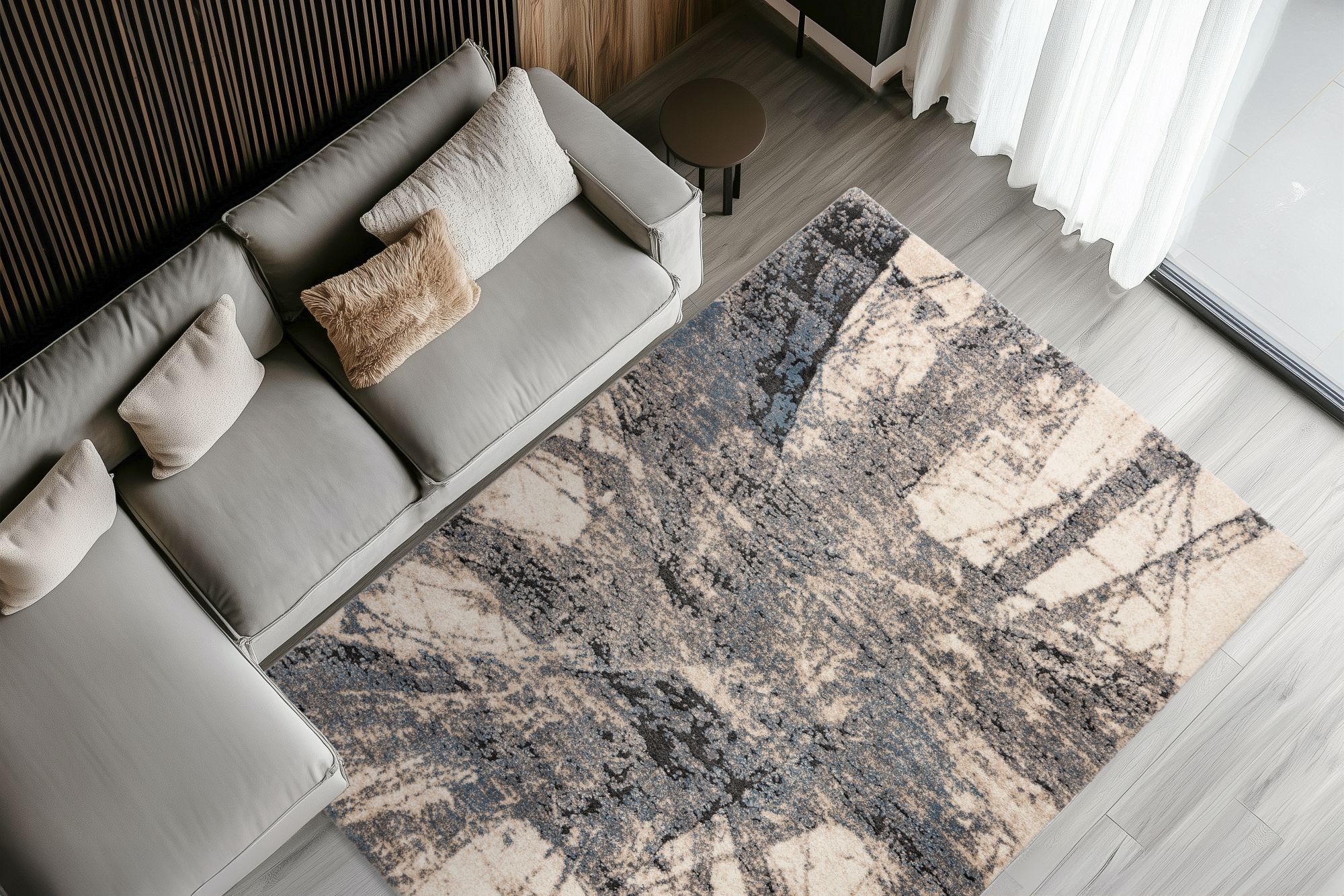 Blauer Design-Teppich 120 x 170 cm
