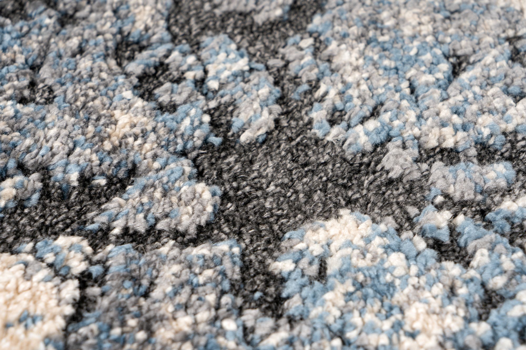 Blauer Design-Teppich 120 x 170 cm